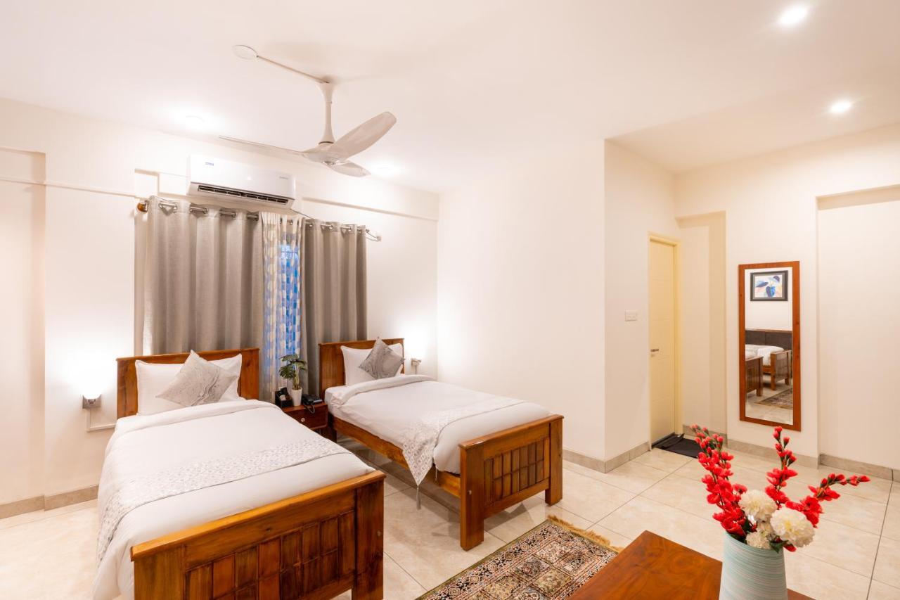 The Silver Chimes Suites Bangalore Exteriör bild