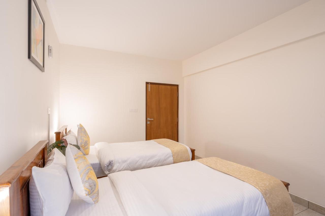 The Silver Chimes Suites Bangalore Exteriör bild